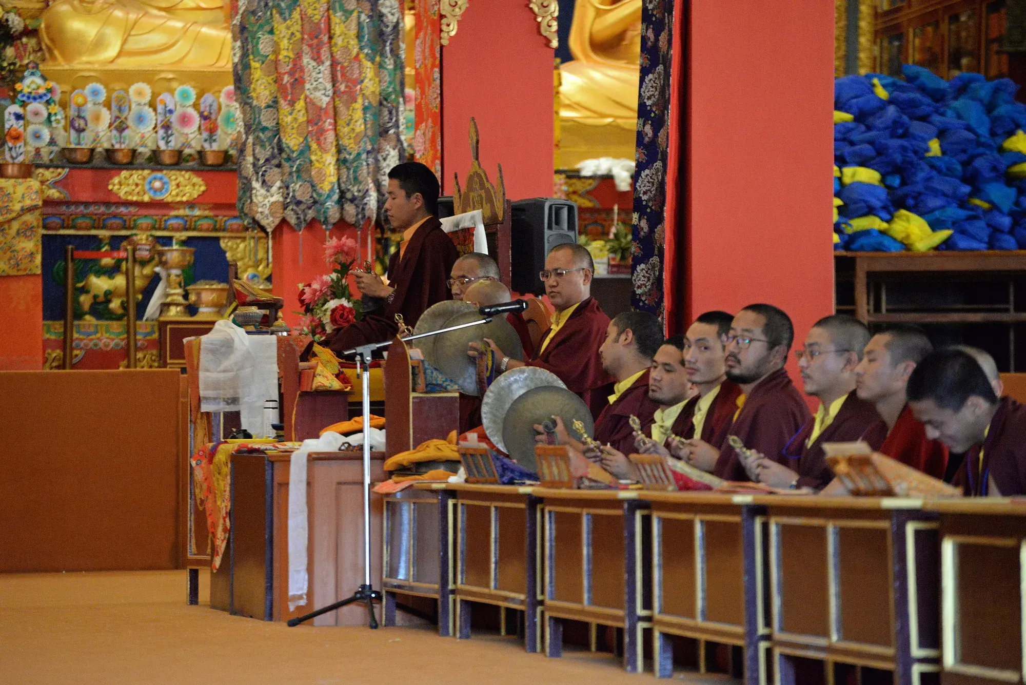 Evening prayers in the hall, watched from the edge
