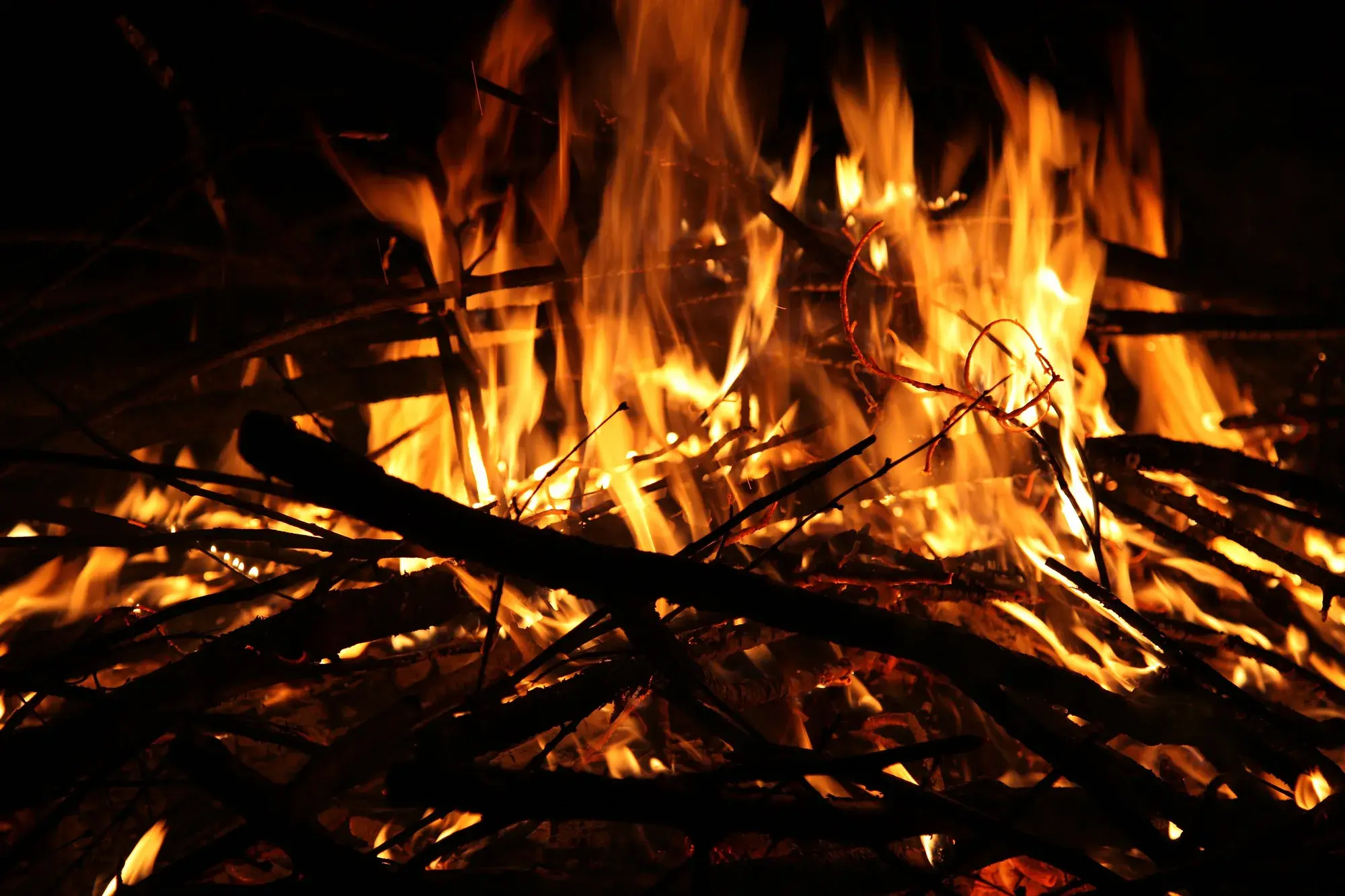 Fire glow at dusk — texture, not landscape
