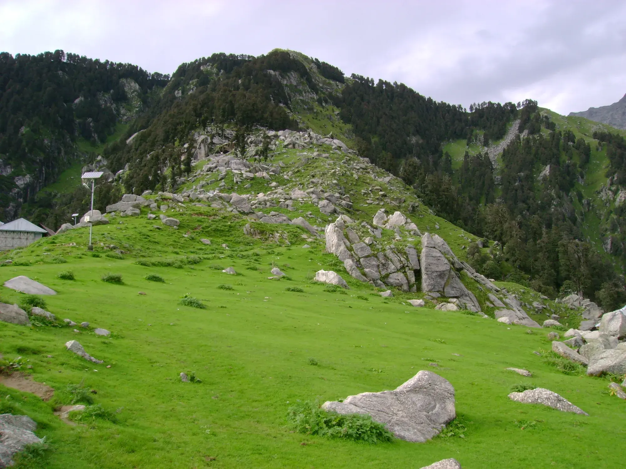 The green ridge above the village